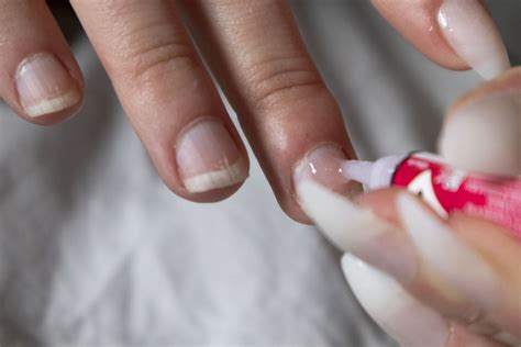 how to get fake nail glue off clothes